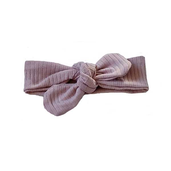 Leuk knoophaarbandje Big Rib is gemaakt van zacht rib katoen in de kleur roze. Geschikt voor de leeftijd 0-6 maanden en komt uit de collectie van Little Adventure.