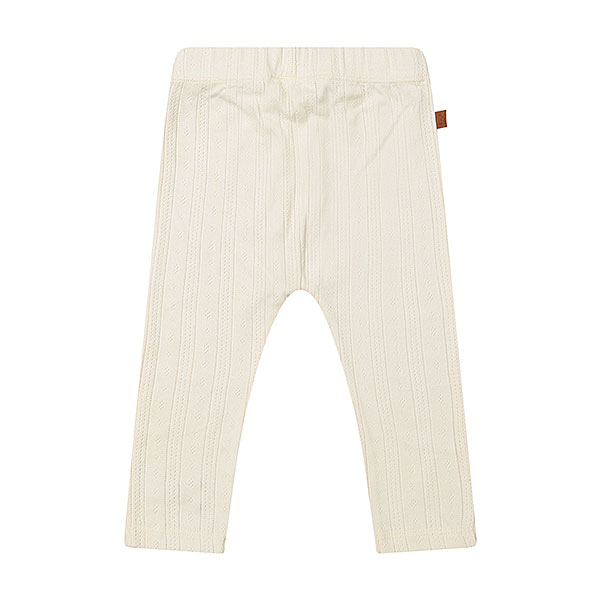 Deze mooie gebroken witte legging komt uit de Spring Lucky collectie van Frogs and Dogs. De legging is gemaakt van zachte stof met gebreide gaatjes. Aan de linker voorzijde, onderaan, zitten geborduurde bloemetjes & hartjes. De legging heeft een elastische banden de pijpjes zijn gezoomd.