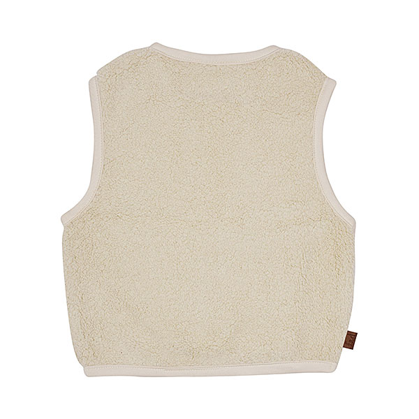 Dit schattige teddy giletje in de kleur beige komt uit de All Collection collectie van Frogs and Dogs. Het giletje is gemaakt van zachte teddystof met aan de voorzijde 2 knoopjes.