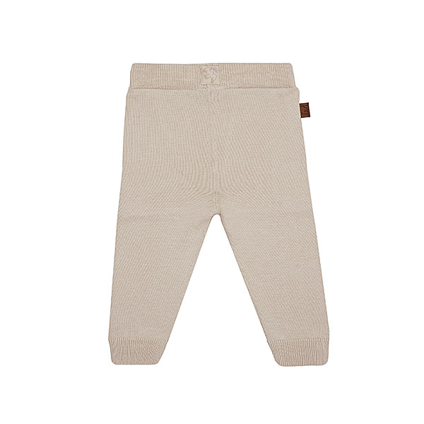 Dit mooie fijn gebreide beige broekje komt uit de collectie Paloma van Frogs en Dogs. Het broekje is effen van kleur en heeft een elastische tailleband en boordjes aan de pijpjes.