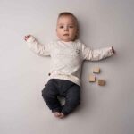 Frogs and Dogs baby & kinder shirt lange mouw off white met lijnpatroon en geborduurde smiley uit de Smile Club collectie