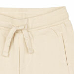 Dit stoere beige korte broekje met een geborduurde knipogende smiley op de kont komt uit de Happy with You collectie van Frogs and Dogs. Gemaakt van zacht en luchtig materiaal voor extra comfort. Perfect voor zomerse dagen en dagelijks gebruik. Het broekje heeft 2 steekzakjes. Dankzij de elastische tailleband met koord zit het broekje comfortabel en blijft hij goed op zijn plek.