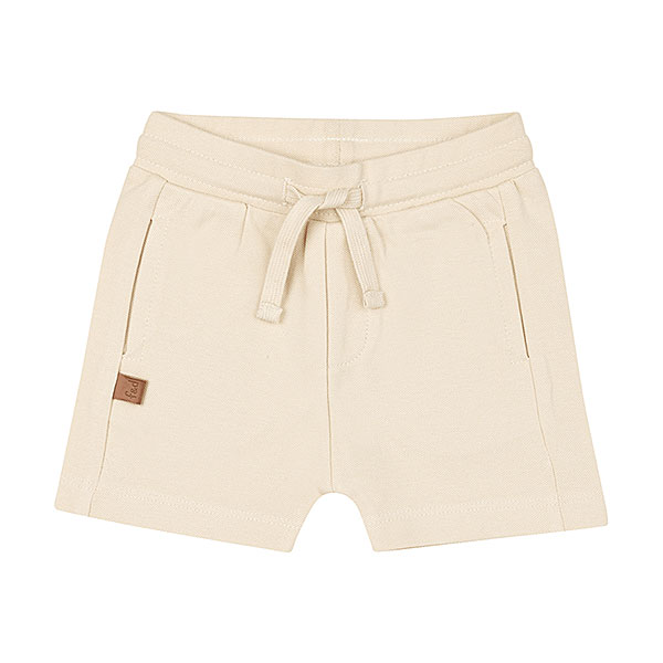 Dit stoere beige korte broekje met een geborduurde knipogende smiley op de kont komt uit de Happy with You collectie van Frogs and Dogs. Gemaakt van zacht en luchtig materiaal voor extra comfort. Perfect voor zomerse dagen en dagelijks gebruik. Het broekje heeft 2 steekzakjes. Dankzij de elastische tailleband met koord zit het broekje comfortabel en blijft hij goed op zijn plek.