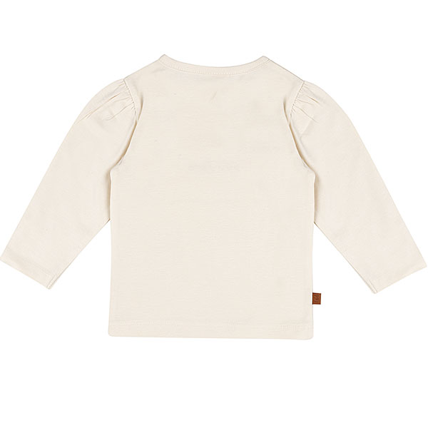 Crèmekleurig baby t-shirtje met lange mouw, tekst ‘Little Love’, lila hartje en pofmouwtjes uit de Frogs and Dogs collectie.