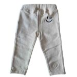 Frogs and Dogs baby bikerpants beige uit de Happy with You collectie met blauw koordje en geborduurde smiley achterop