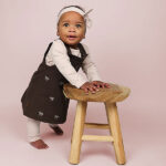 Frogs and Dogs baby & peuterjurkje Ballerina Bow Seal Brown met strikjes in sepia rose