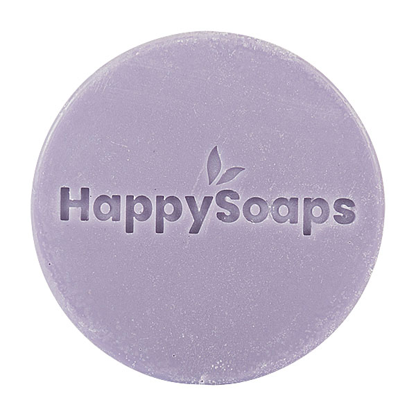 Paarse HappySoaps Lavender Bliss Conditioner Bar naast kartonnen verpakking