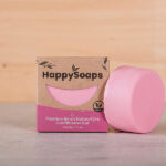 Roze HappySoaps Tender Rose Conditioner Bar naast de verpakking