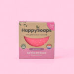 HappySoaps La Vie en Rose Shampoo Bar in roze tinten met ronde vorm en kartonnen verpakking