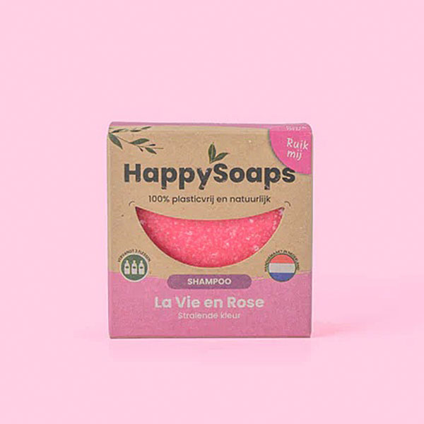 HappySoaps La Vie en Rose Shampoo Bar in roze tinten met ronde vorm en kartonnen verpakking