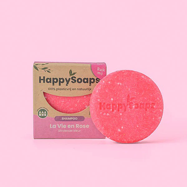 HappySoaps La Vie en Rose Shampoo Bar in roze tinten met ronde vorm en kartonnen verpakking