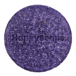 Paarse HappySoaps Purple Lavender Rain Shampoo Bar met natuurlijke structuur en ronde vorm