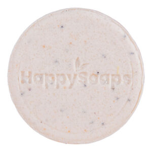 Witte HappySoaps Totally Coco Nuts Shampoo Bar met subtiele stukjes kokos en clean background