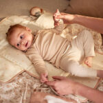 verschoonmatje baby hydrofiel olive green opvouwbaar met vakken onderweg